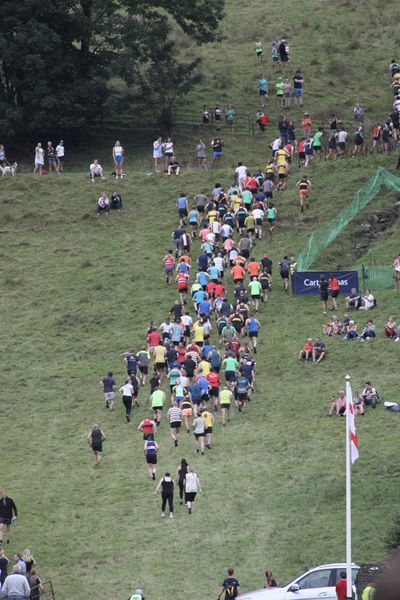 Fell runners head up the fell at the 2022 Grasmere Lakeland Sports and Show