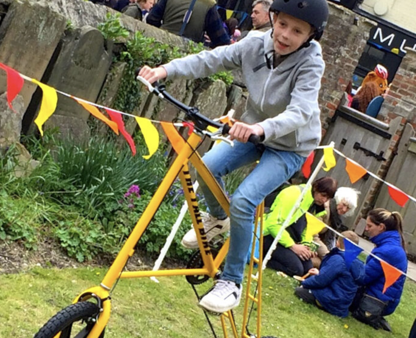 A child getting to grips with one of the quirky bikes from Wonder Wheelers