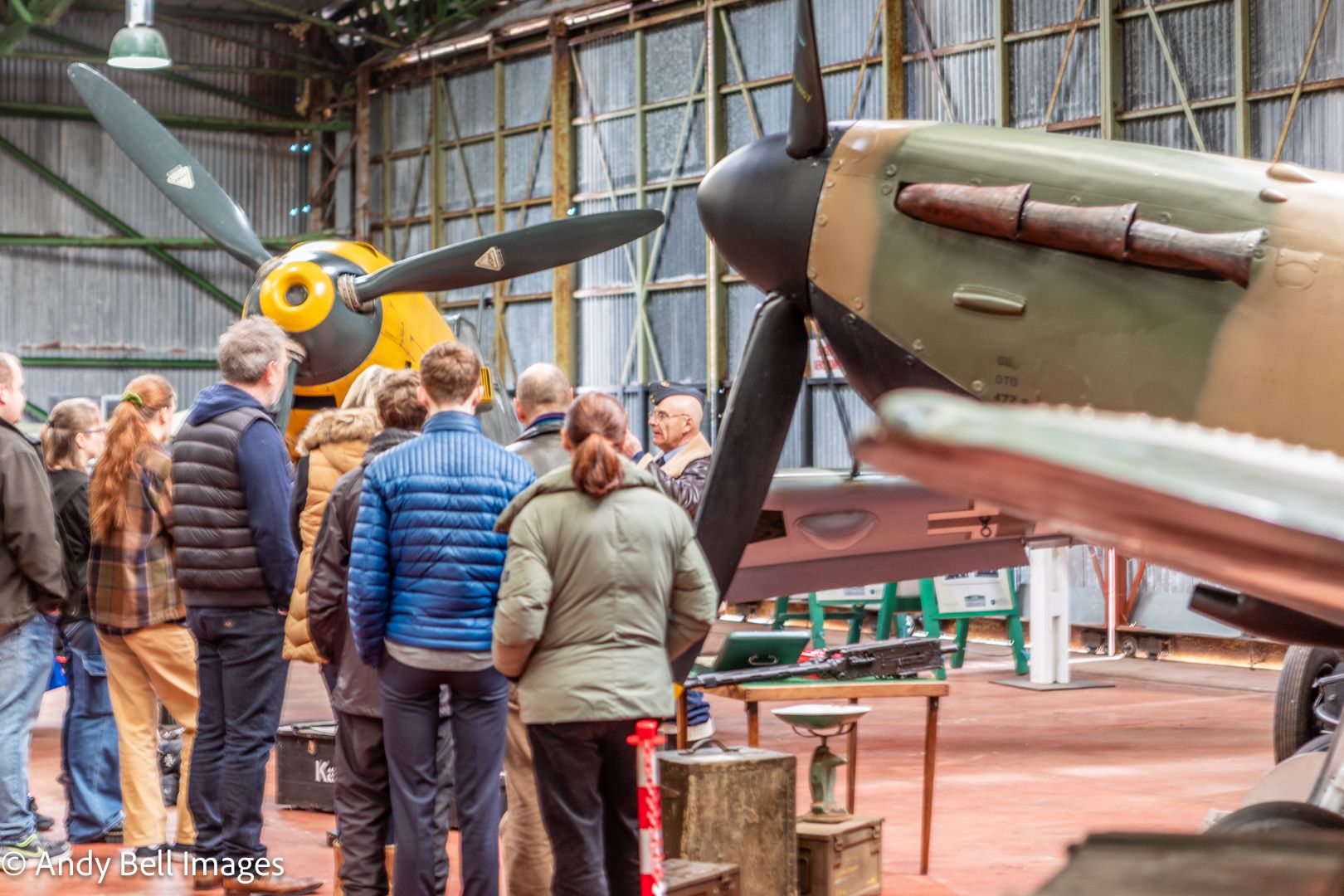 Visitors listen to one of the volunteers interpreting the exhibits at the Spitfire Visitor Centre: Hangar 42, Blackpool