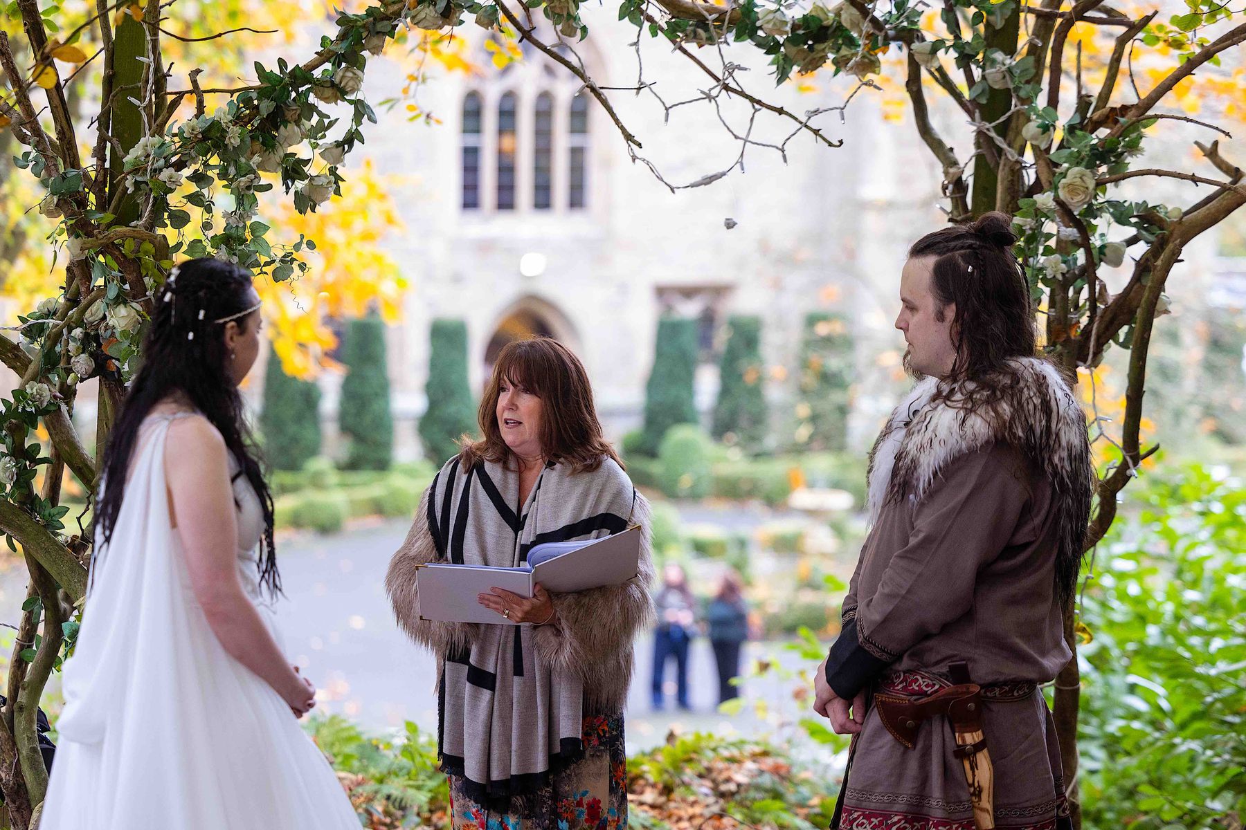 Couple having Viking-themed woodland wedding at Langley Castle, Northumberland