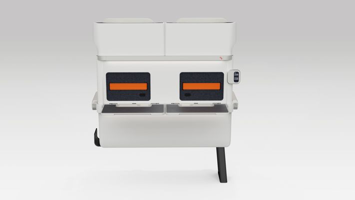 Rear view of a pair of ALIZÉ rail seats with both tables down.  