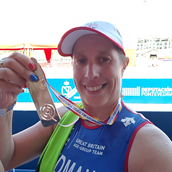 Tasha Redman with medal.jpg