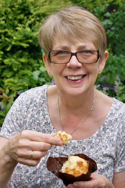 Woman eating a vegetarian muffin