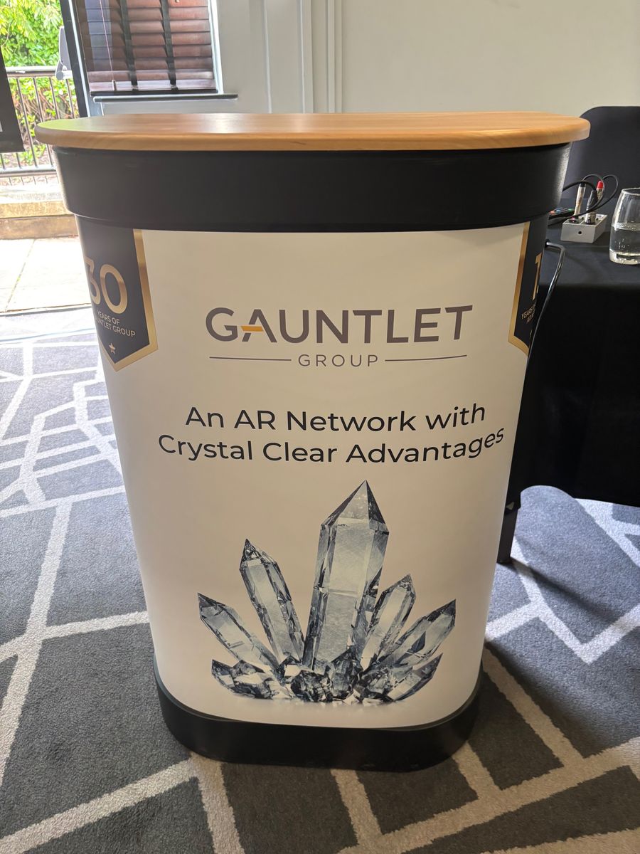 Podium celebrating 15 years of the Gauntlet Appointed Representative Network, at the 2024 annual AR Conference.