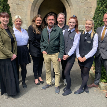 TV presenter, Richard Hammond, with staff at Langley Castle, near Haydon Bridge, Northumberland