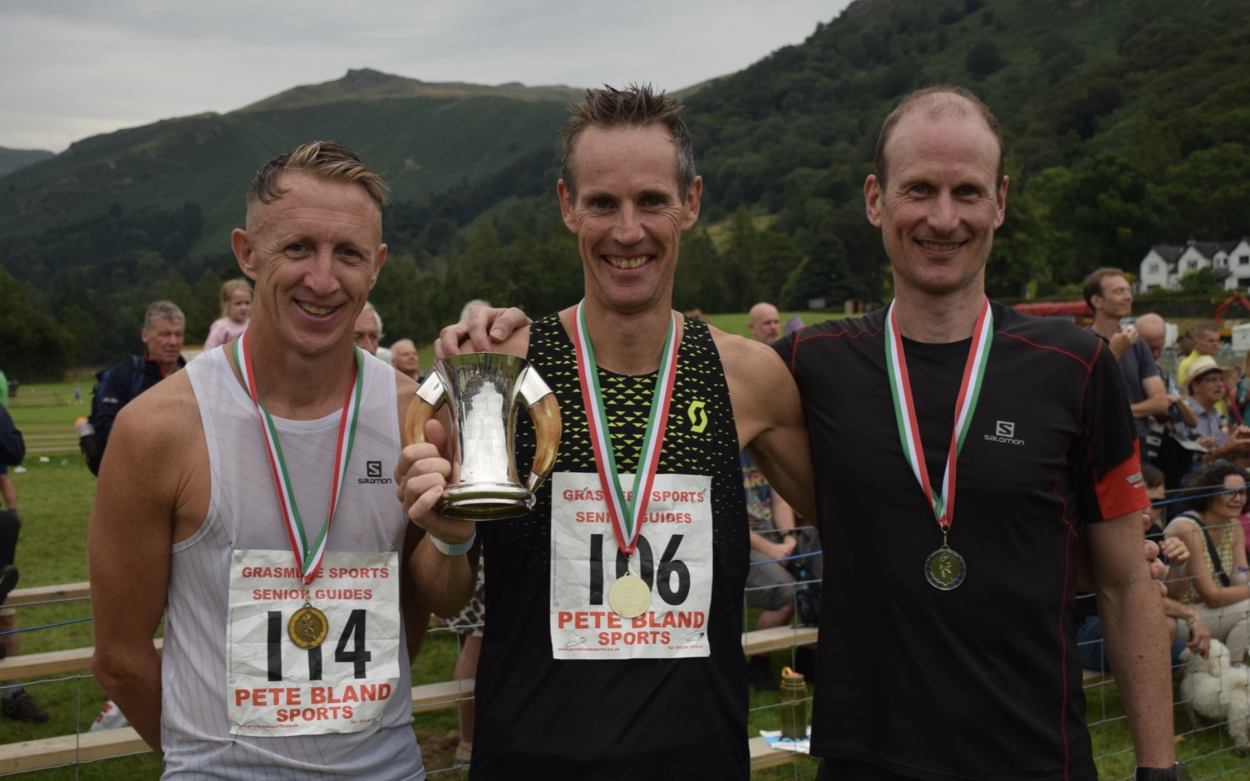 Grasmere Sports 2022 Senior Guides Fell Race Veteran winner, Rob Jebb (centre) with Mark McGoldrick (right) and Rob Hope (left)