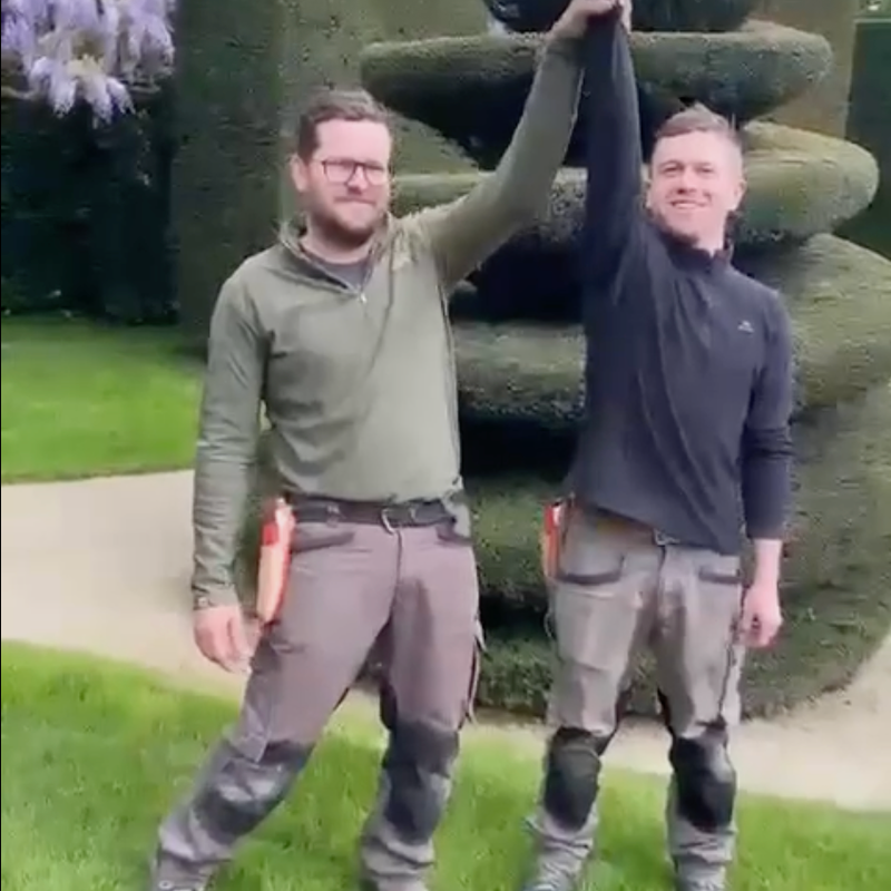 Some of the gardening team at the Chateau et Jardins de la Ballue, in Brittany, with the Topiary Message in a Bottle.