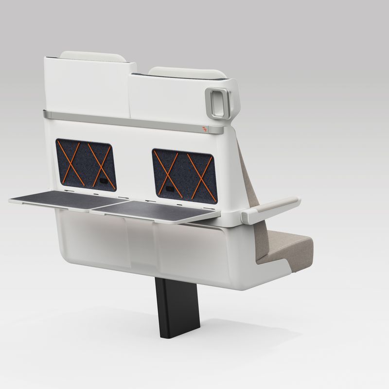 Rear view of pair of ALIZÉ seats with both tables open and arms down 