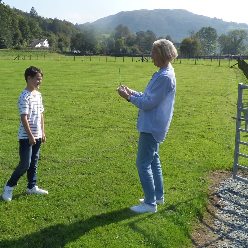 Grasmere Lakeland Sports and Show 'Young Sports Reporter 2024', Harry Taylor, receiving his trophy.