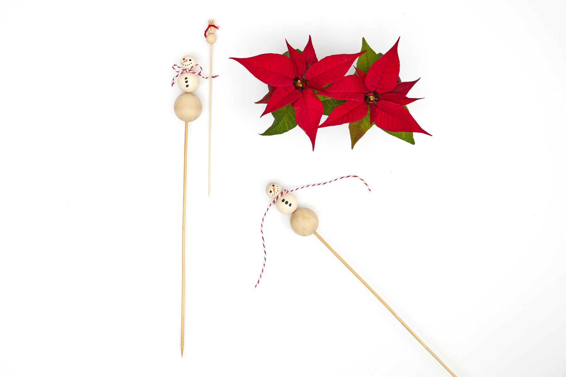 2022_poinsettia_05120_DIY_Decorative_Snowman_Flower_Sticks_04.jpg