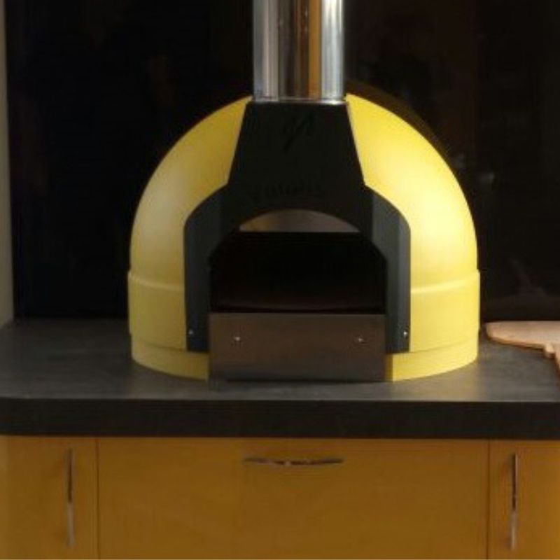 Cucina - the indoor version of the Fornino 60 oven - in an indoor kitchen setting.