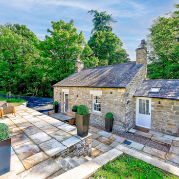 Exterior and private, secluded terrace of Toll Bar Luxury Villa at Langley Castle, Northumberland, UK
