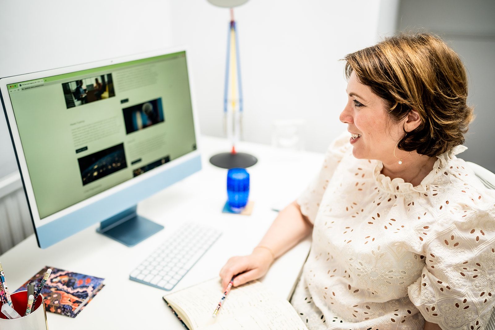 Jane Griffin, Positive Story PR Consultancy sitting at her desk