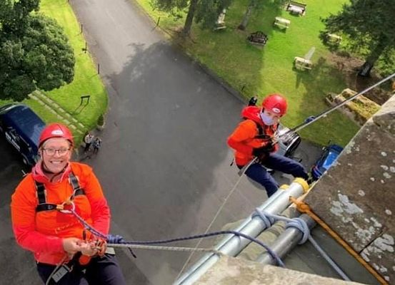 Abseilers in the Great North Abseil, at Langley Castle Hotel, Northumberland