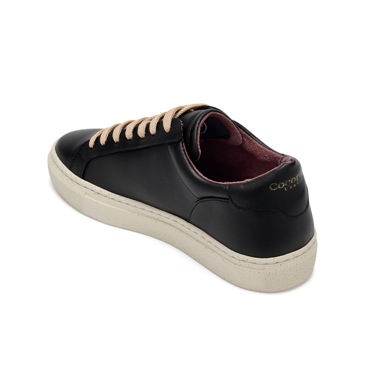 Plant-powered 'Kew' vegan trainer from Cocorose London, in sleek black and with black heel tab,