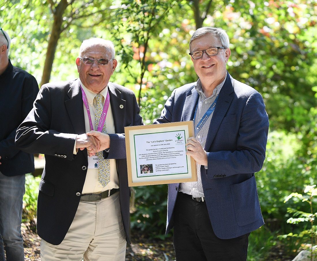 John presents certificate to CEO, Richard House.jpg