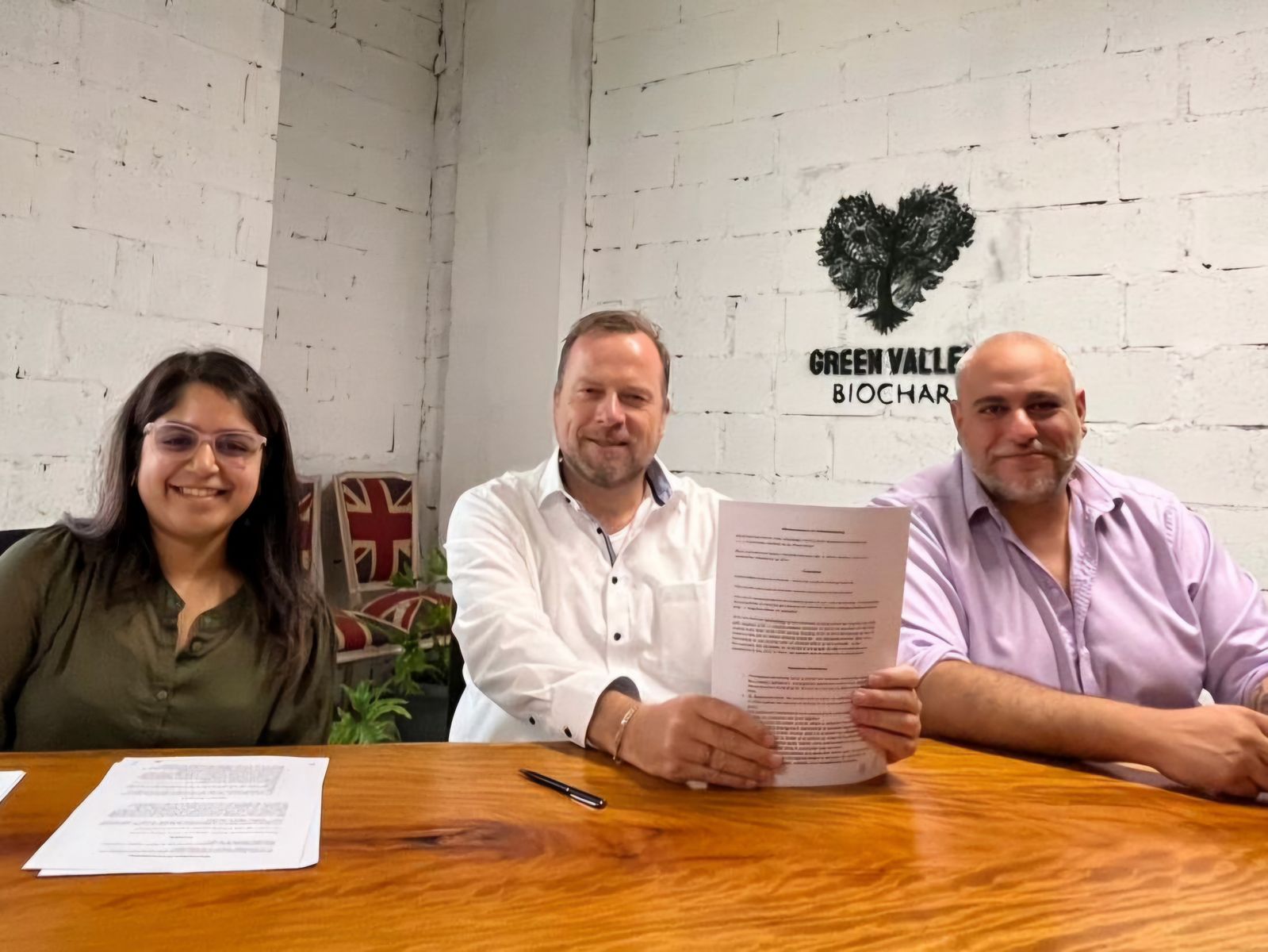 Bton signing MoU with co-founders of Green Valley Biochar.jpg