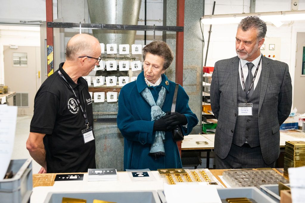 Finishing supervisor Mr Trevor Saunders explains processes to HRH The Princess Royal