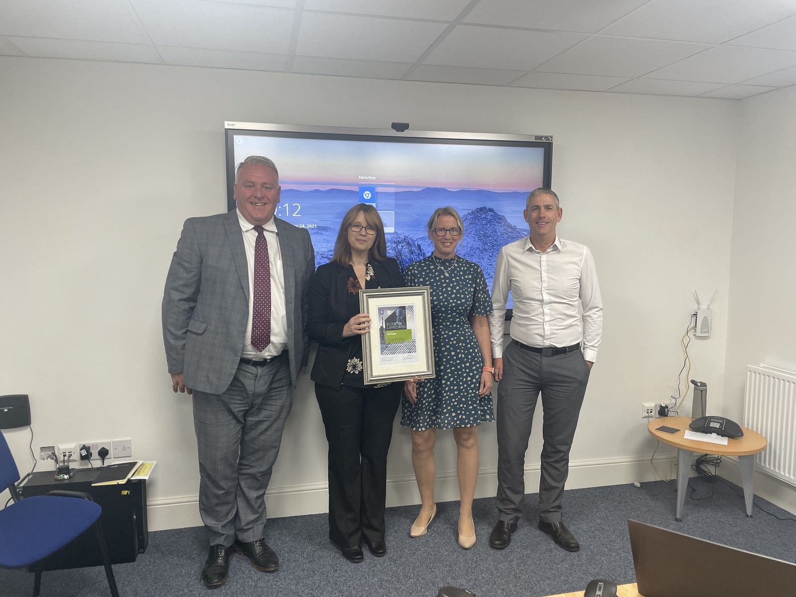 L-R_ The ‘Supplier Recognition and Appreciation Award’ was presented to Pete Toseland and Dawn Shaw, L.B. Foster, by Jill Polisena and Paul Sims from Rolls-Royce..jpg