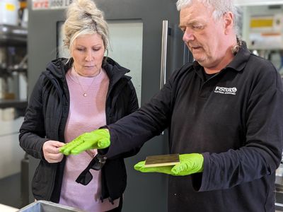 Engineering operative Roland Caughey with Dr Vanessa Brady OBE