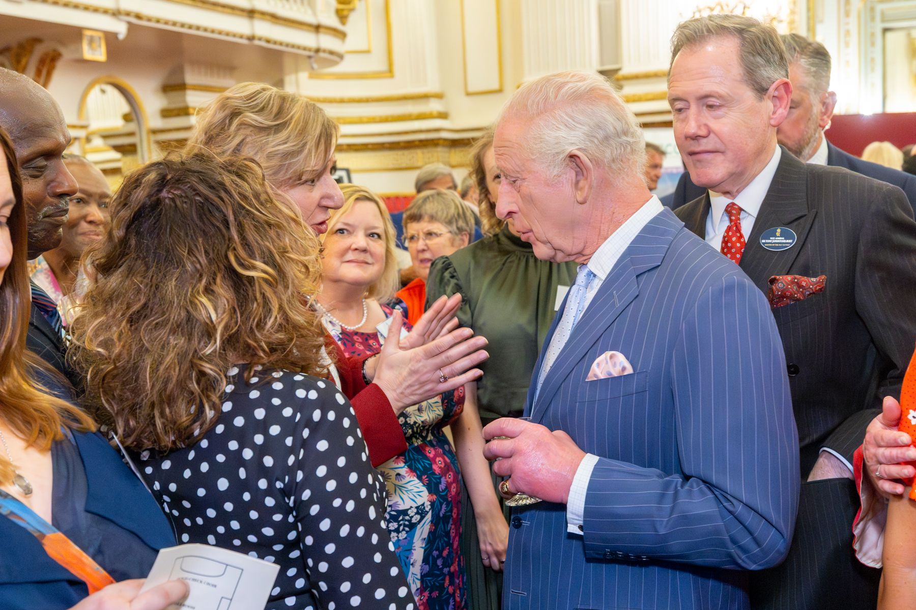  CEO Tina Seymour (centre) meeting HM The King