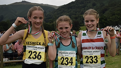 Isabella Wright (far right) of Keighley & Craven club, at Grasmere Sports 2022