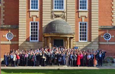 Attendees celebrate International Women's Day outside Lady Margaret Hall