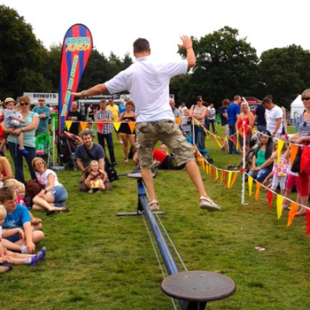 Man taking part in a Circus Avago circus workshop