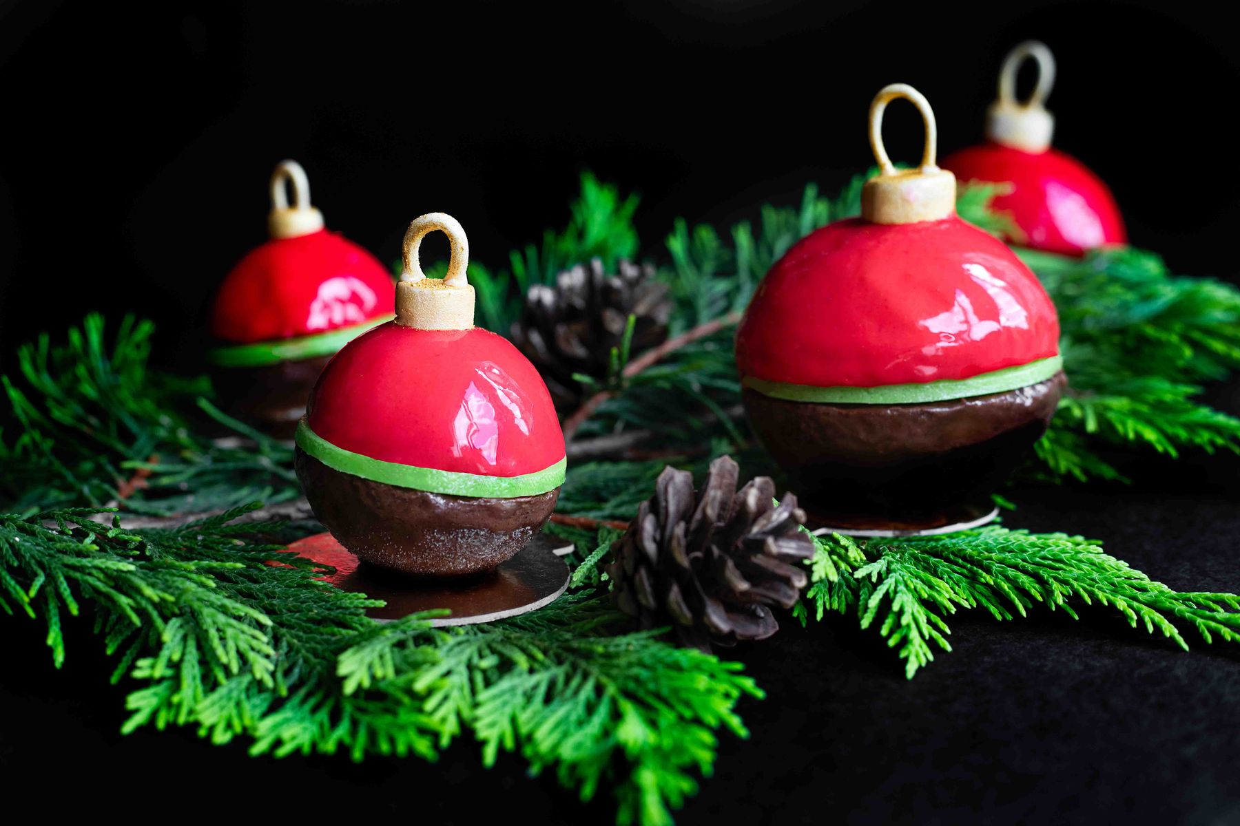 Christmas baubles, a raspberry mousse on a decadent brownie