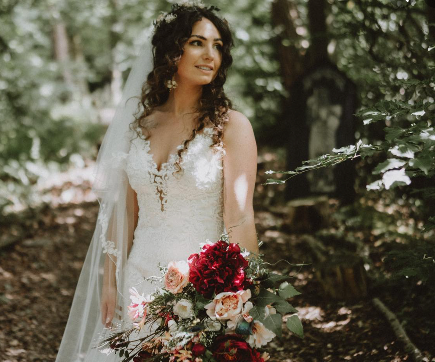 Couple Pippa-Rosy and Chris Parkes, marrying in the woodland wedding grove at Langley Castle, Northumberland, in July 2023.