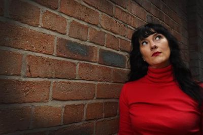 poet pic red roll neck.jpg