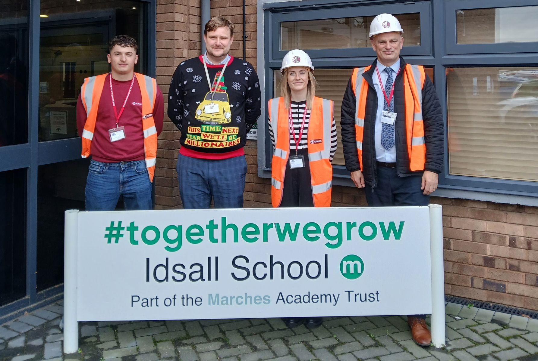 Pic caption (L-R) - McPhillips apprentice Ollie Fudge, Idsall School Head of Construction Graham Northall, McPhillips social value co-ordinator Emily Myatt and McPhillips procurement manager Roger Cox.jpg