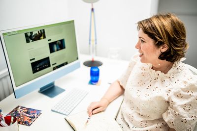 Jane Griffin, Positive Story PR Consultancy sitting at her desk