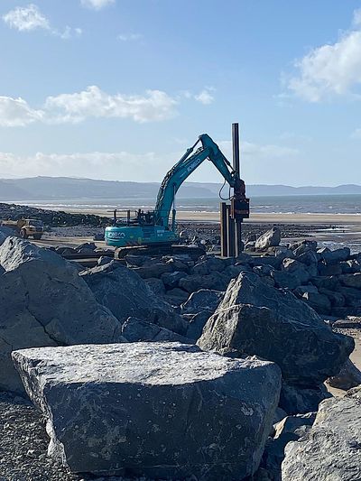 Sheet Piling (UK) Limited working on a coastal erosion project at Kinmel Bay, North Wales