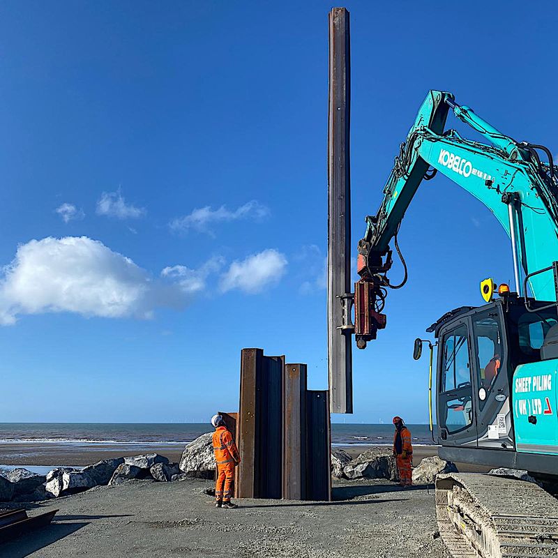 Sheet Piling (UK) Limited working on a coastal erosion project at Kinmel Bay, North Wales