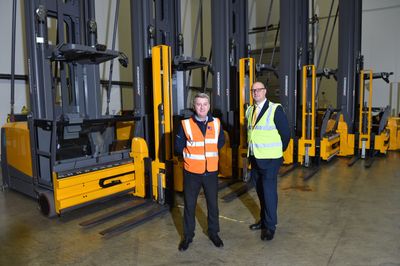 (l-r) Ged Carabini and Kevin Barber with some of the EKX 516 VNA fleet.jpg
