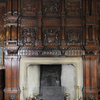 The overmantel and fireplace in the Large Drawing Room at Levens Hall and Gardens, Cumbria, UK.