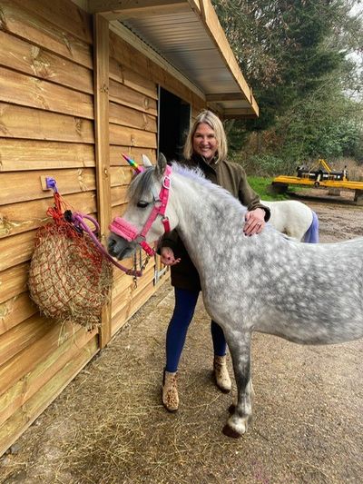 Susie Marsden, Managing Director with one of the Wyvernwood unicorns