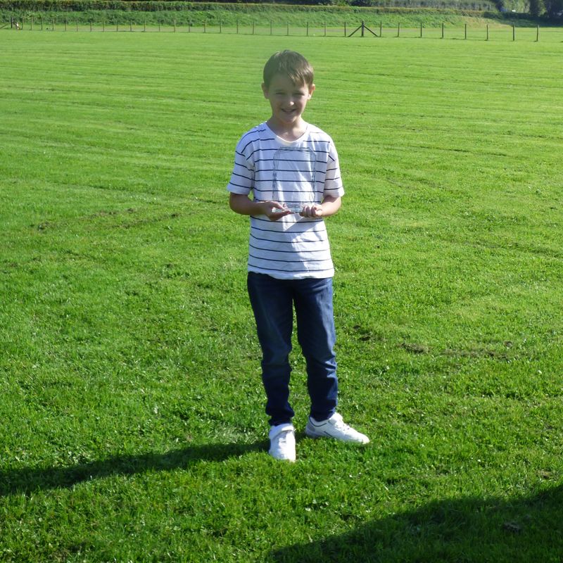 Grasmere Lakeland Sports and Show 'Young Sports Reporter 2024', Harry Taylor, with his trophy.