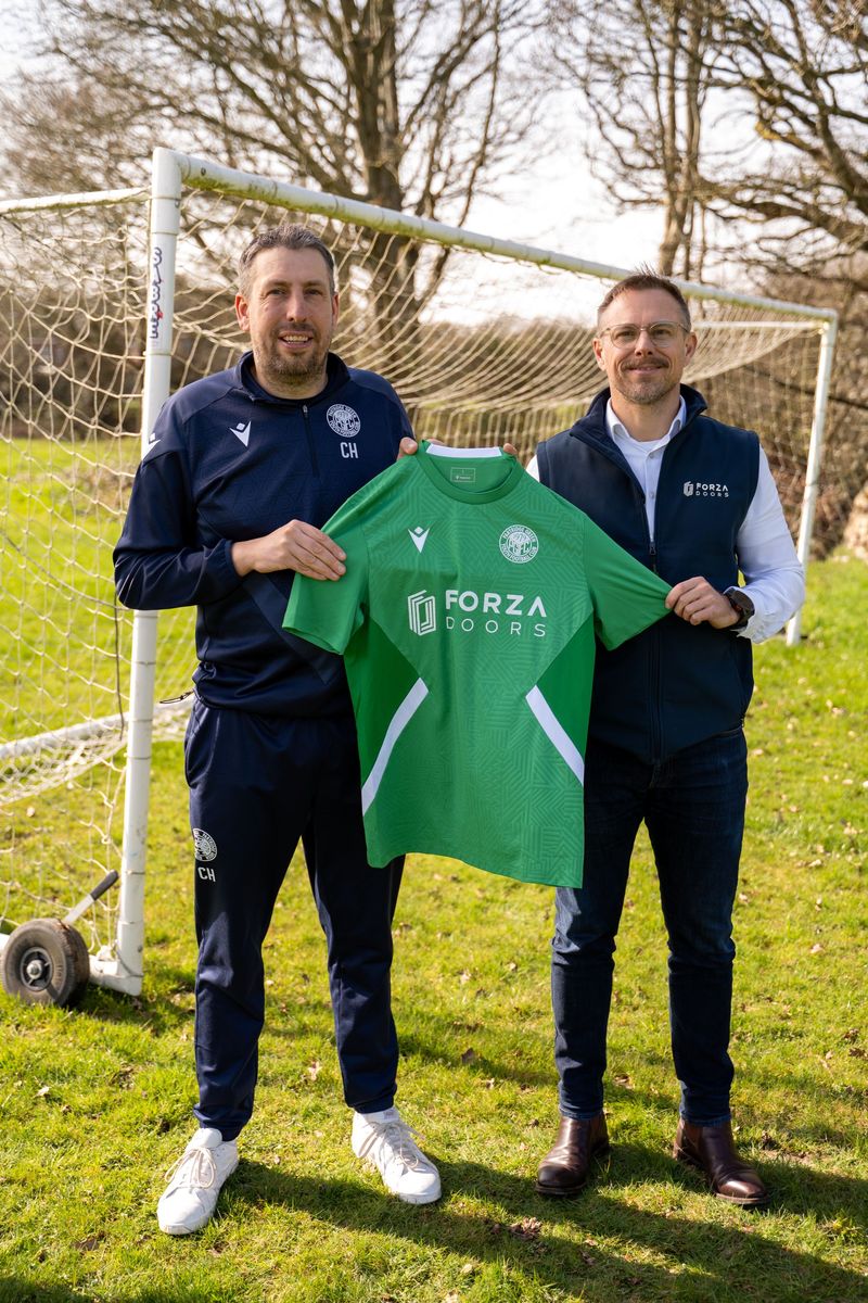 Chris Holland (left) and Will Hunnam (right) with Forza Doors-sponsored kit.