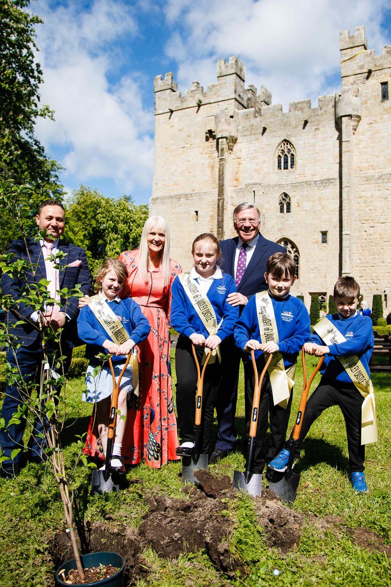 Pupils from Haydon Bridge's Shaftoe Trust Academy plant four of 40 trees planted at Langley Castle Hotel and Restaurant in Langley-on-Tyne, Northumberland,