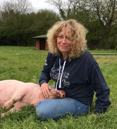 Juliet with rescued piglet