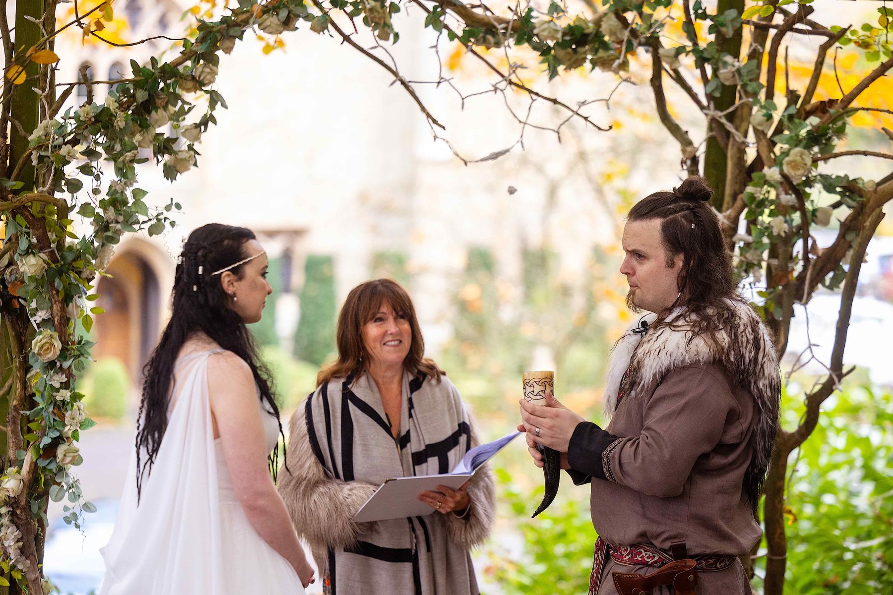 Couple in Viking wedding ceremony at Langley Castle, Northumberland