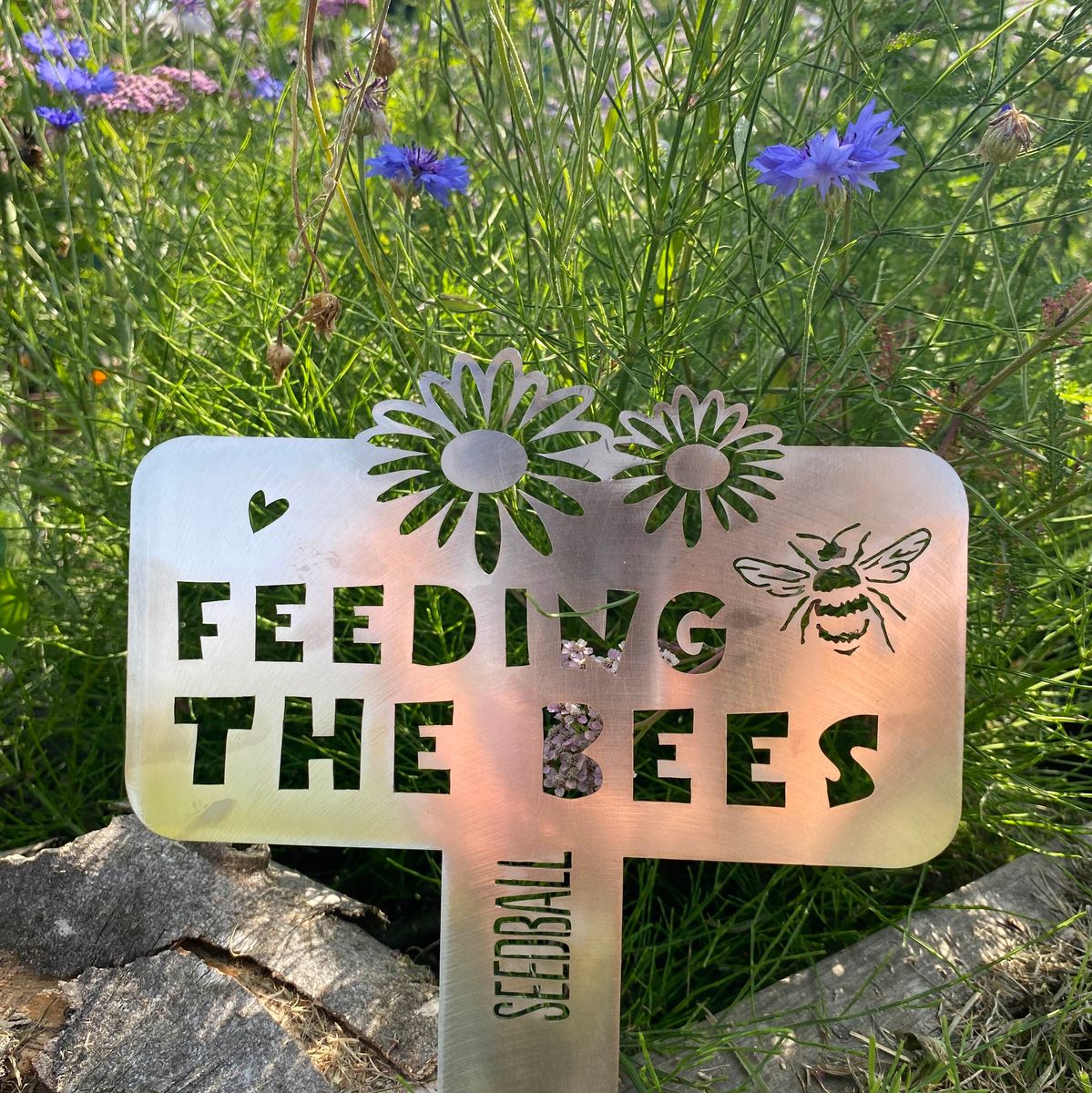 Feeding the bees sign