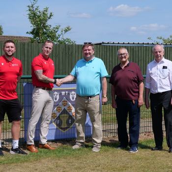 Left to right, Joe Pygall and Leigh Jones from Moulton College, Mark Darnell, Martin Potton and Mick Walden of Welligborough Town Football Club.png