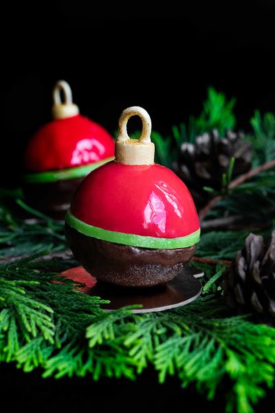 Christmas baubles, a raspberry mousse on a decadent brownie