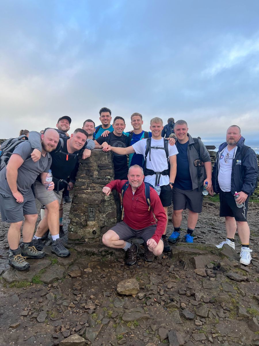 The 11 members of the McCarron Coates broking and claims team in Leeds, who completed the Three Peaks challenge, to raise money for charity.