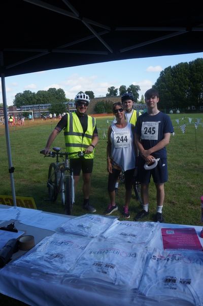Andrea Moore, fundraising champion for the event with her son James and father.jpg