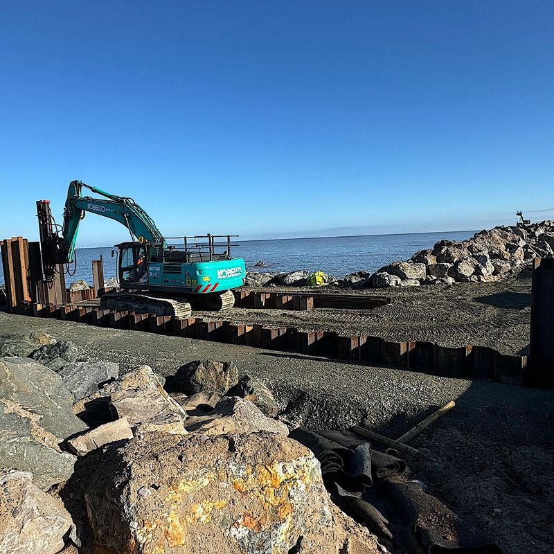 Sheet Piling (UK) Limited working on a coastal erosion project at Kinmel Bay, North Wales