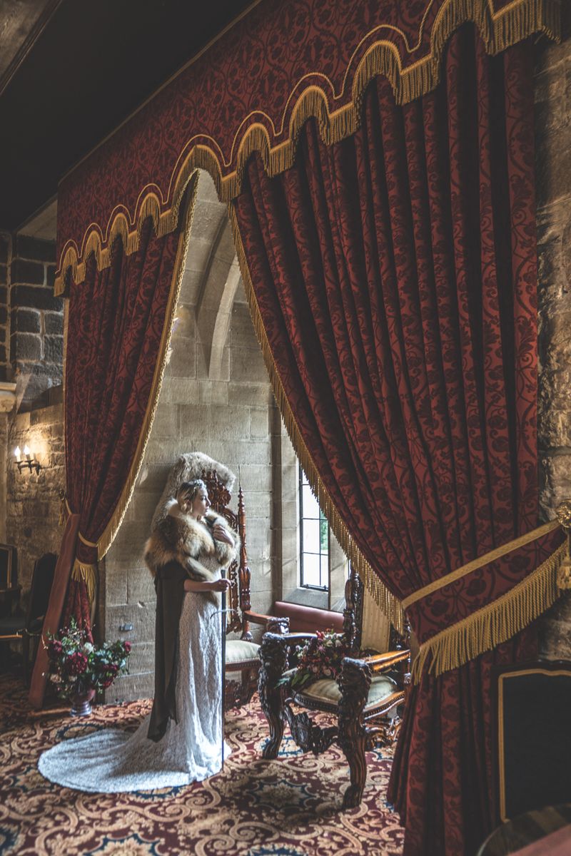 Lady of the manor: woman stands in Langley Castle drawing room
